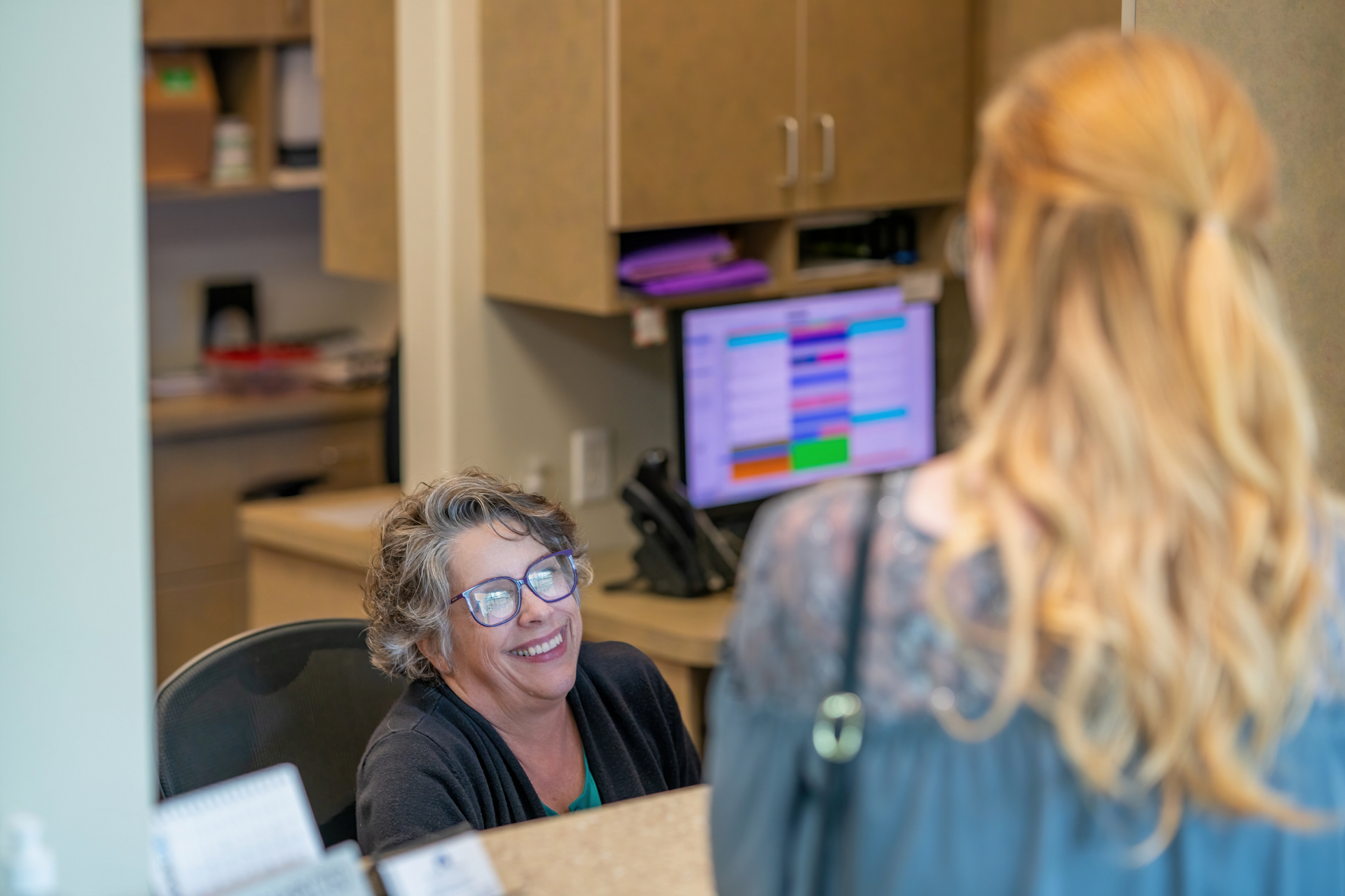 Staff greeting a client